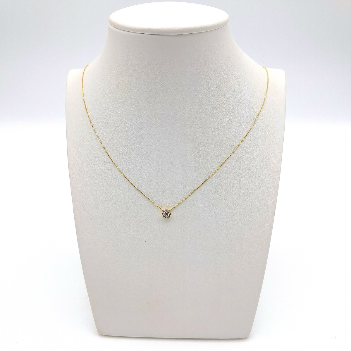 Conunto de oro 18 ktes con brillante, PUNTO DE LUZ. 