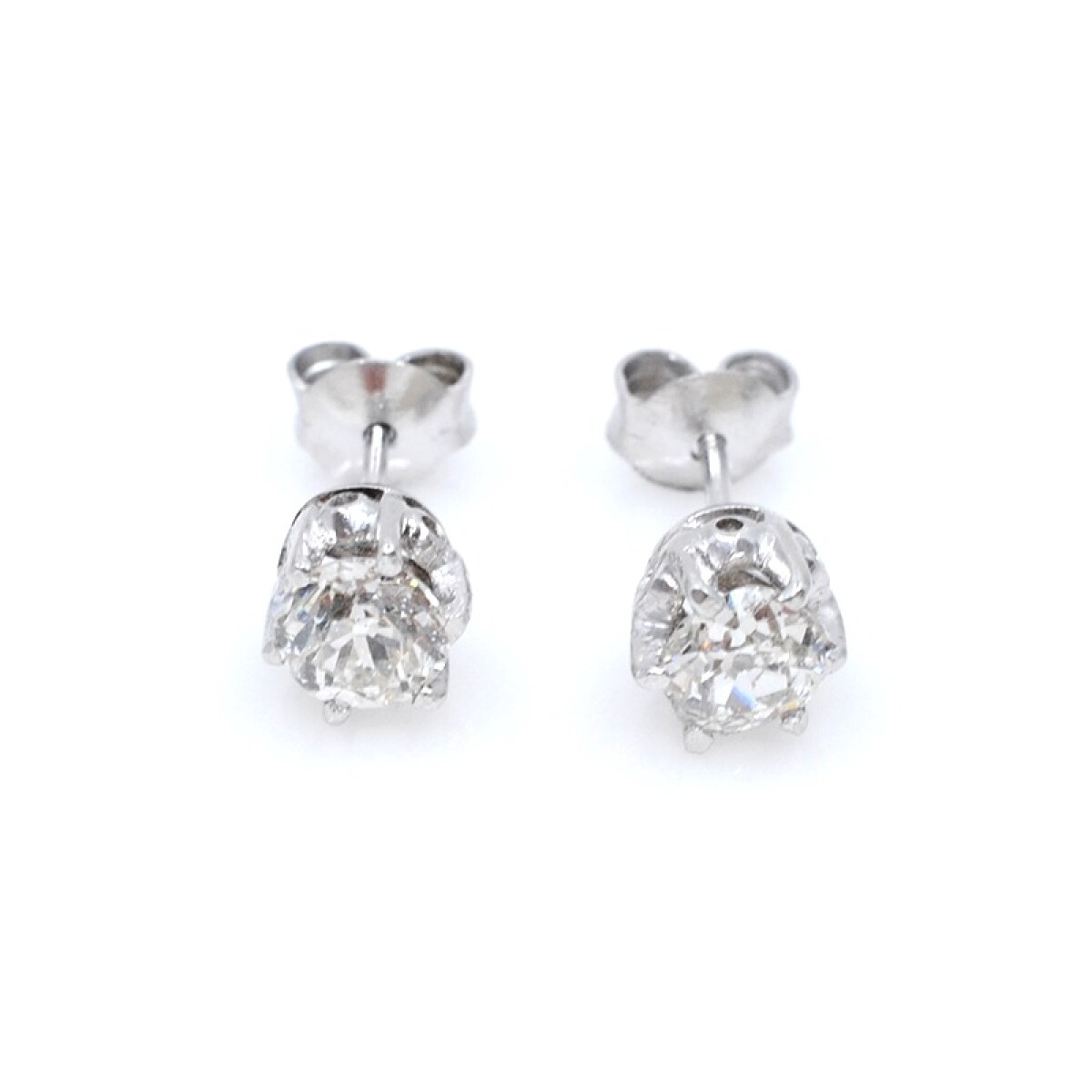 Caravanas en oro 18k blanco y brillantes. 