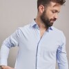 CAMISA TECNICA CELESTE