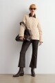 Campera capitoneada cuello pana beige claro