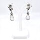 Caravanas En Oro 18K Blanco, Brillantes Y Madre Perla Caravanas En Oro 18K Blanco, Brillantes Y Madre Perla