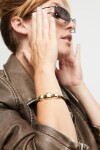 PULSERA DE CUERO CON TRES CUENTAS GRANDES DE ALEACIÓN DE METALES BAÑADAS EN ORO 18K Pulsera