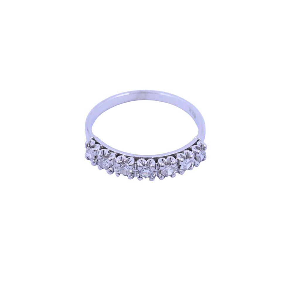 Anillo medio sin fin oro 18k blanco con 7 brillantes engarce 4 puntas. Anillo medio sin fin oro 18k blanco con 7 brillantes engarce 4 puntas.