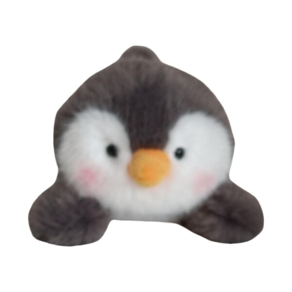 Peluche acostado pingüino