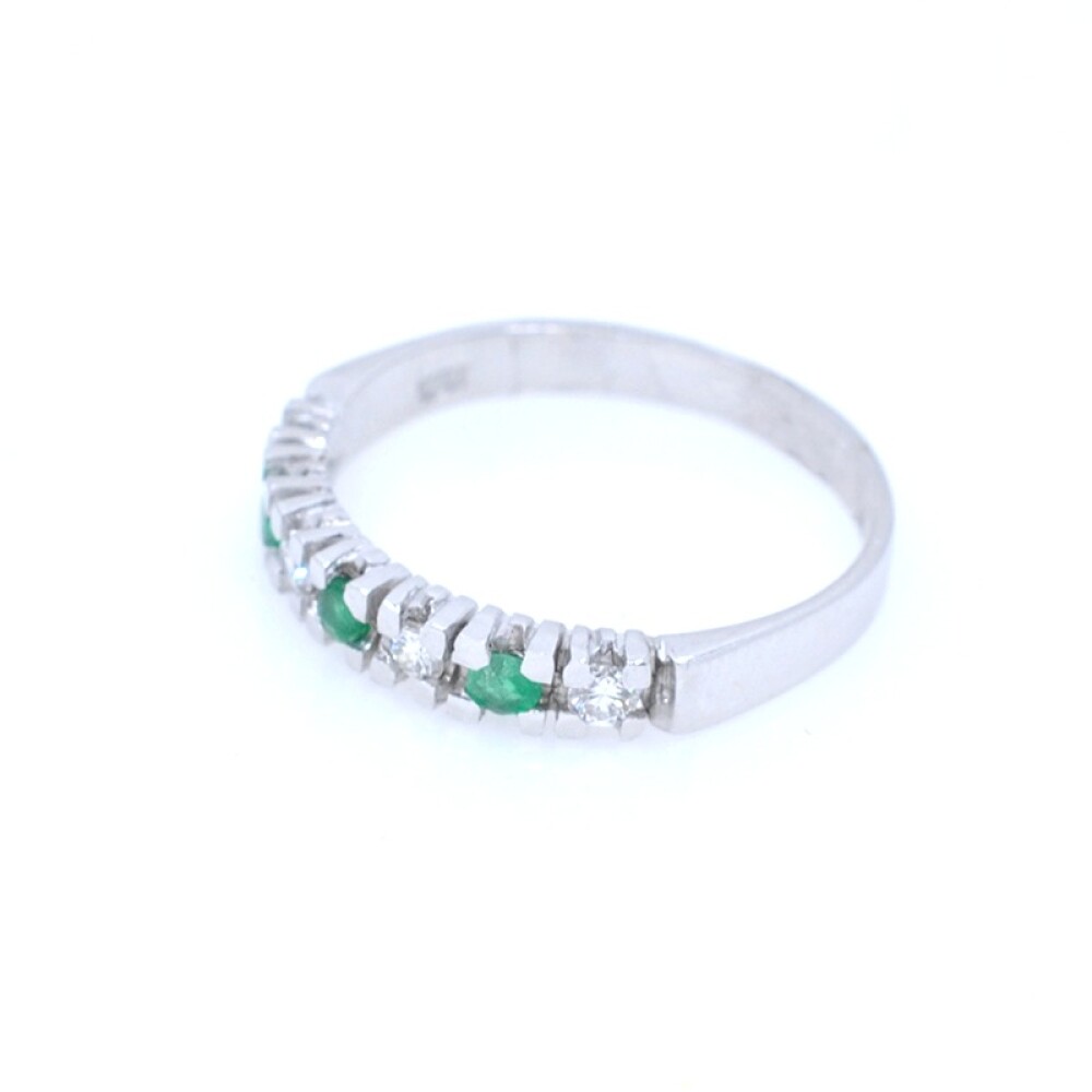 Anillo en oro 18k blanco , brillantes y esmeraldas Anillo en oro 18k blanco , brillantes y esmeraldas