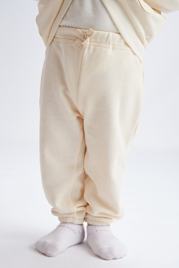 Pantalón deportivo liviano Crema
