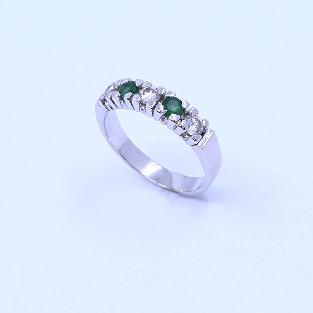 Anillo medio sin fin oro 18k blanco con esmeraldas y brillantes. Anillo medio sin fin oro 18k blanco con esmeraldas y brillantes.