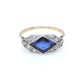 Anillo en oro 18k con piedra de color azul y diamantes Anillo en oro 18k con piedra de color azul y diamantes