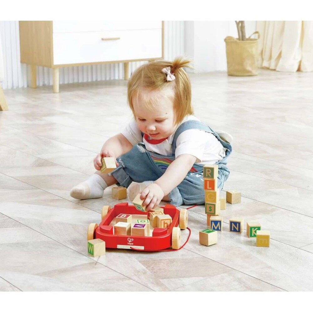 Carro arrastre con bloques de madera HAPE Carro arrastre con bloques de madera HAPE