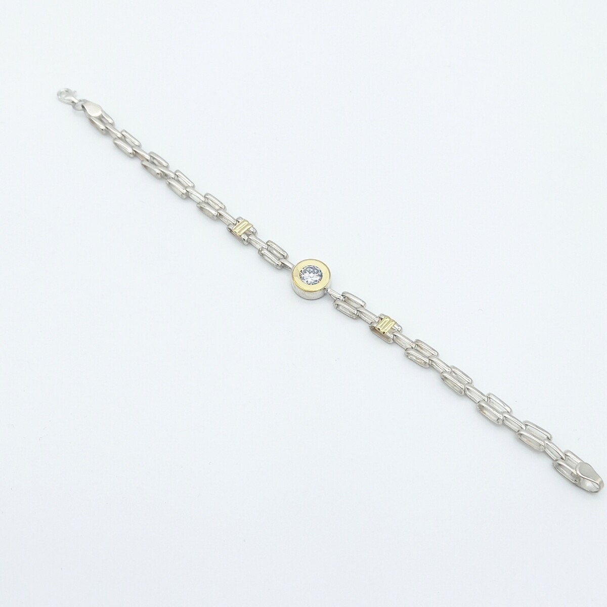 Pulsera de plata 925 y double en oro18 kres con circonia. 