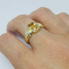 Anillo en oro 18k con topacio y brillantes Anillo en oro 18k con topacio y brillantes