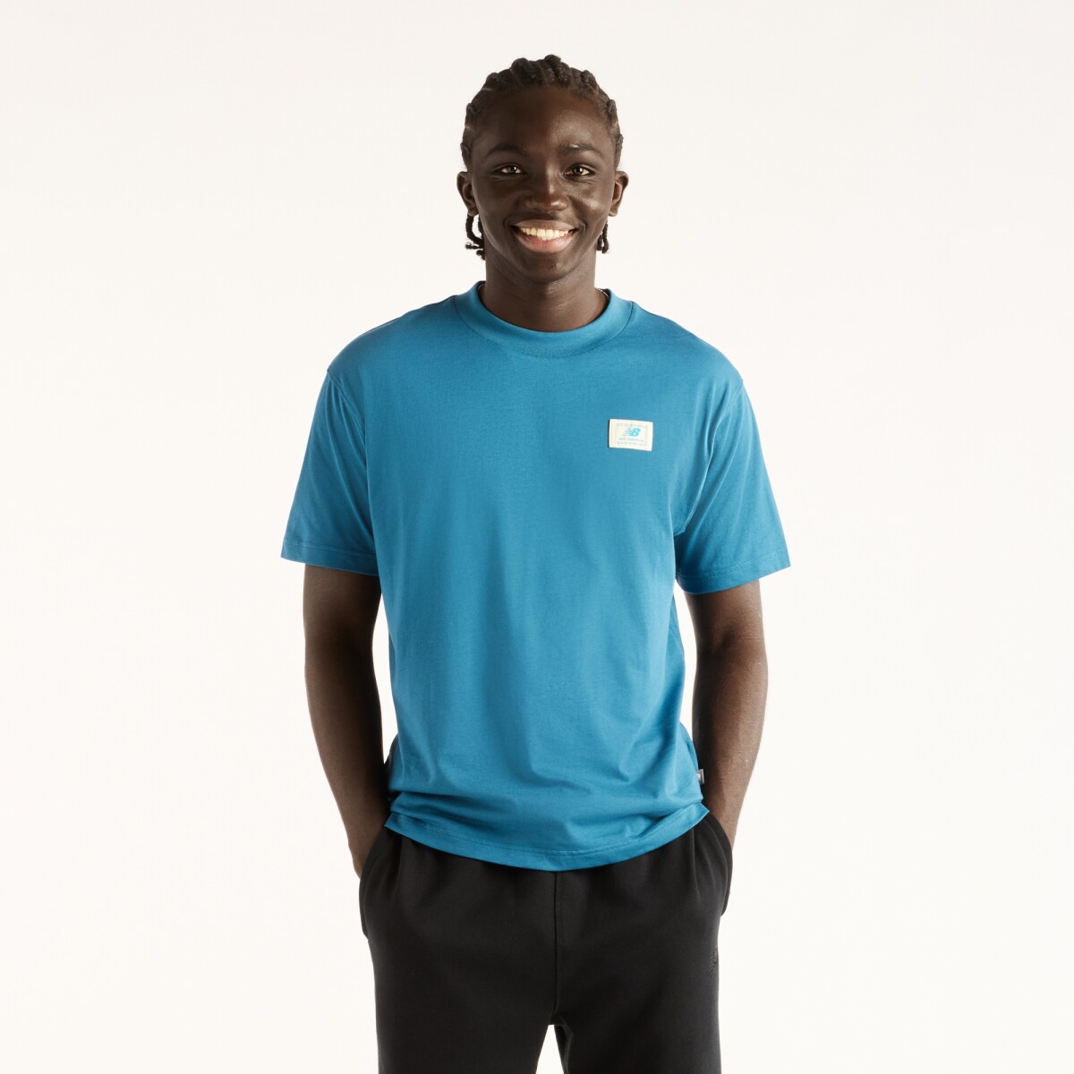 Remera New Balance de Hombre - Woven Label - MT53928STS - BLUE 