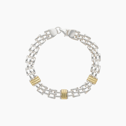 Pulsera en plata y oro con apliques Pulsera En Plata Y Oro Con Apliques