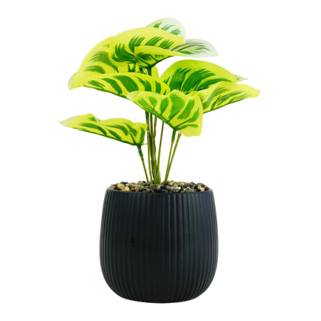 Planta artificial con maceta labrada con piedras Planta artificial con maceta labrada con piedras