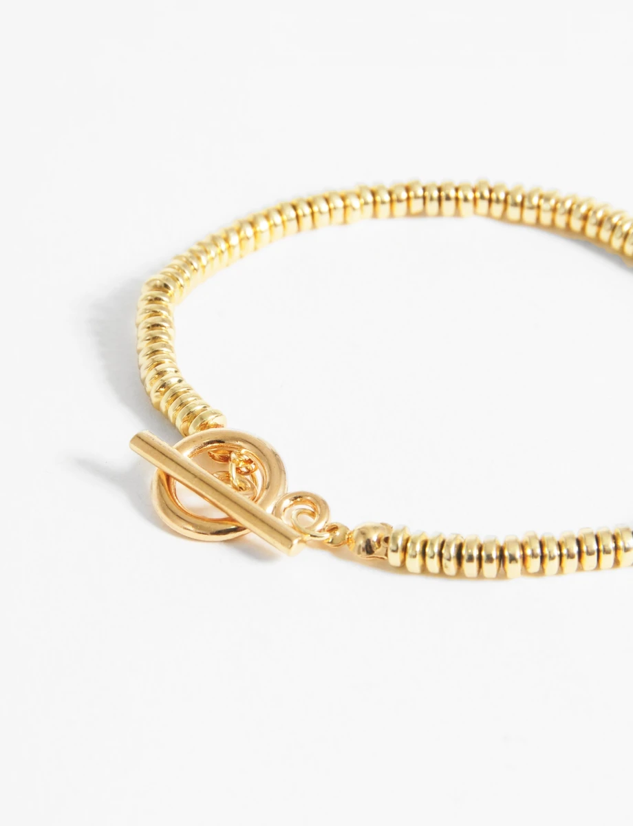 Pulsera cuentas metálicas - dorado 