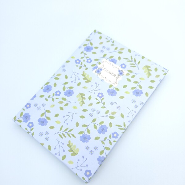 Cuaderno floreado A6 celeste