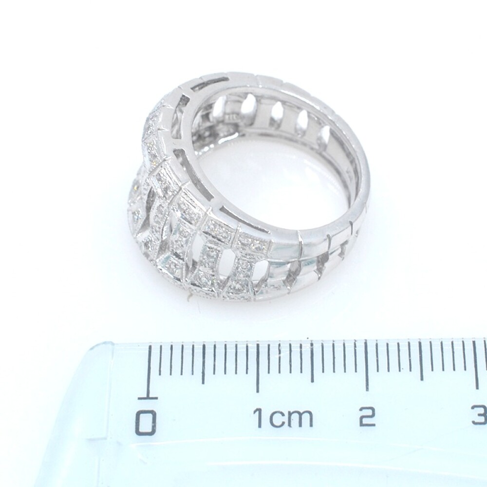 Anillo en oro 18k blanco, calado, con brillantes Anillo en oro 18k blanco, calado, con brillantes