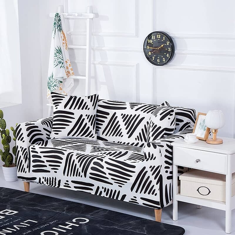 Funda sillón 1 cuerpo estampada Triangulos Negros